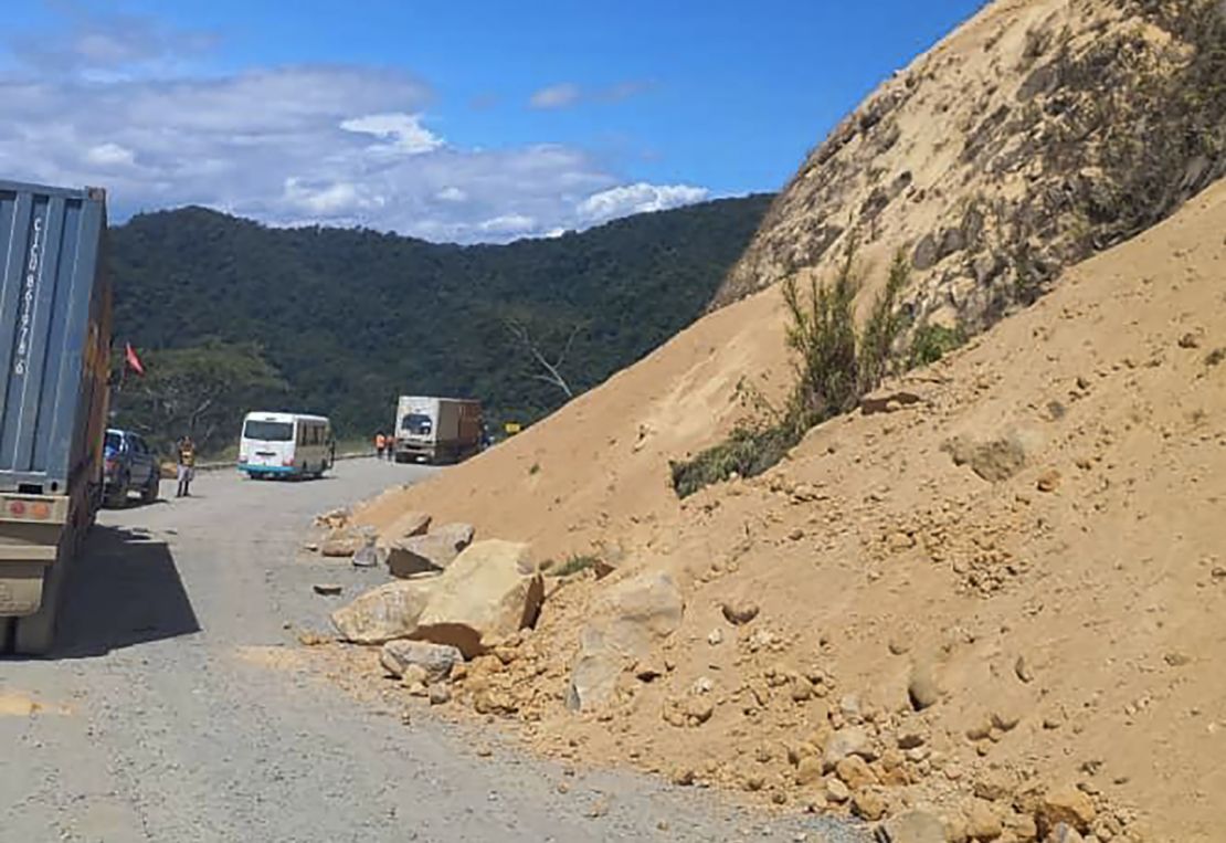 Debris lies strewn across a highway following a landslide near the town of Kainantu, following a 7.6-magnitude earthquake in northeastern Papua New Guinea on Sunday, Sept. 11, 2022. 