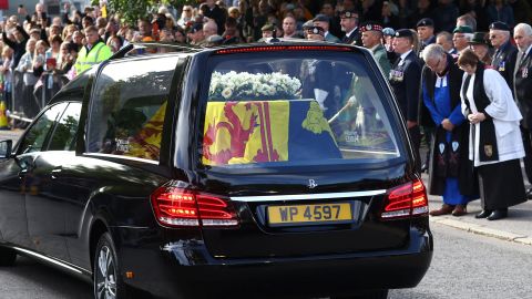 Queen’s coffin arrives at royal residence in Scottish capital, the first leg of her final journey