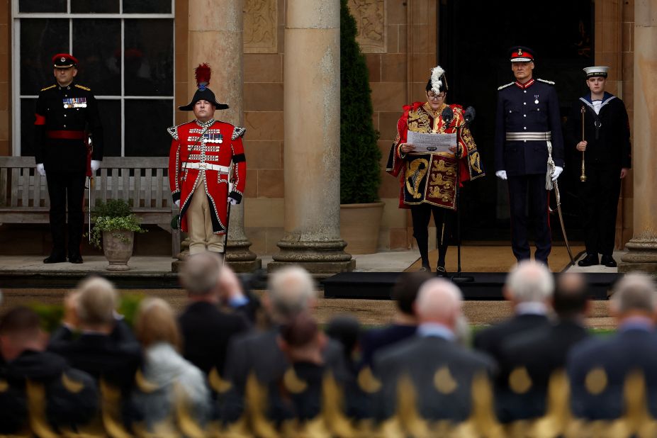 Robert Noel, the Norroy and Ulster King of Arms, reads the King's proclamation of accession during a ceremony at Hillsborough Castle in Northern Ireland.