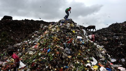 Children work in the polluted hazardous areas of Chittagong's waste dump in Bangladesh,  May 30, 2022. 