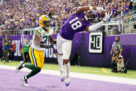 Minnesota Vikings wide receiver Justin Jefferson (18) had nine receptions for 184 yards and two touchdowns in a big 23-7 division win over the Green Bay Packers on Sept. 11 in Minneapolis.  This pass, however, was incomplete.