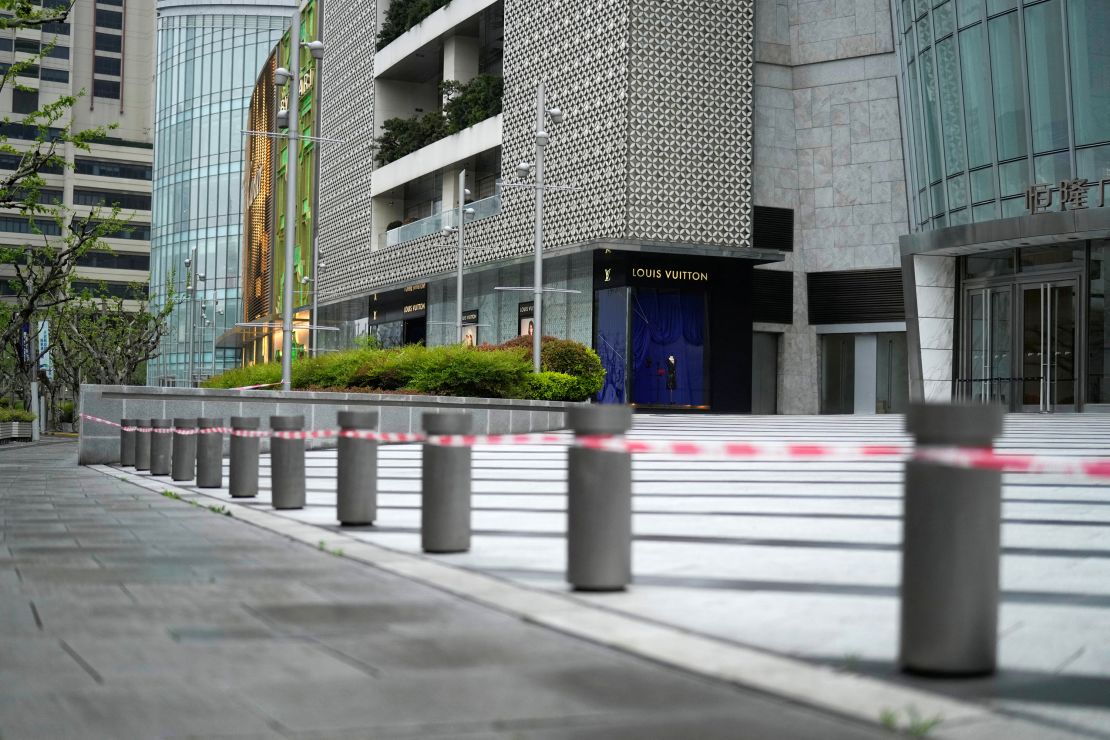 A closed shopping mall is seen on a street during lockdown amid the coronavirus disease (COVID-19) pandemic, in Shanghai, China April 14, 2022. 