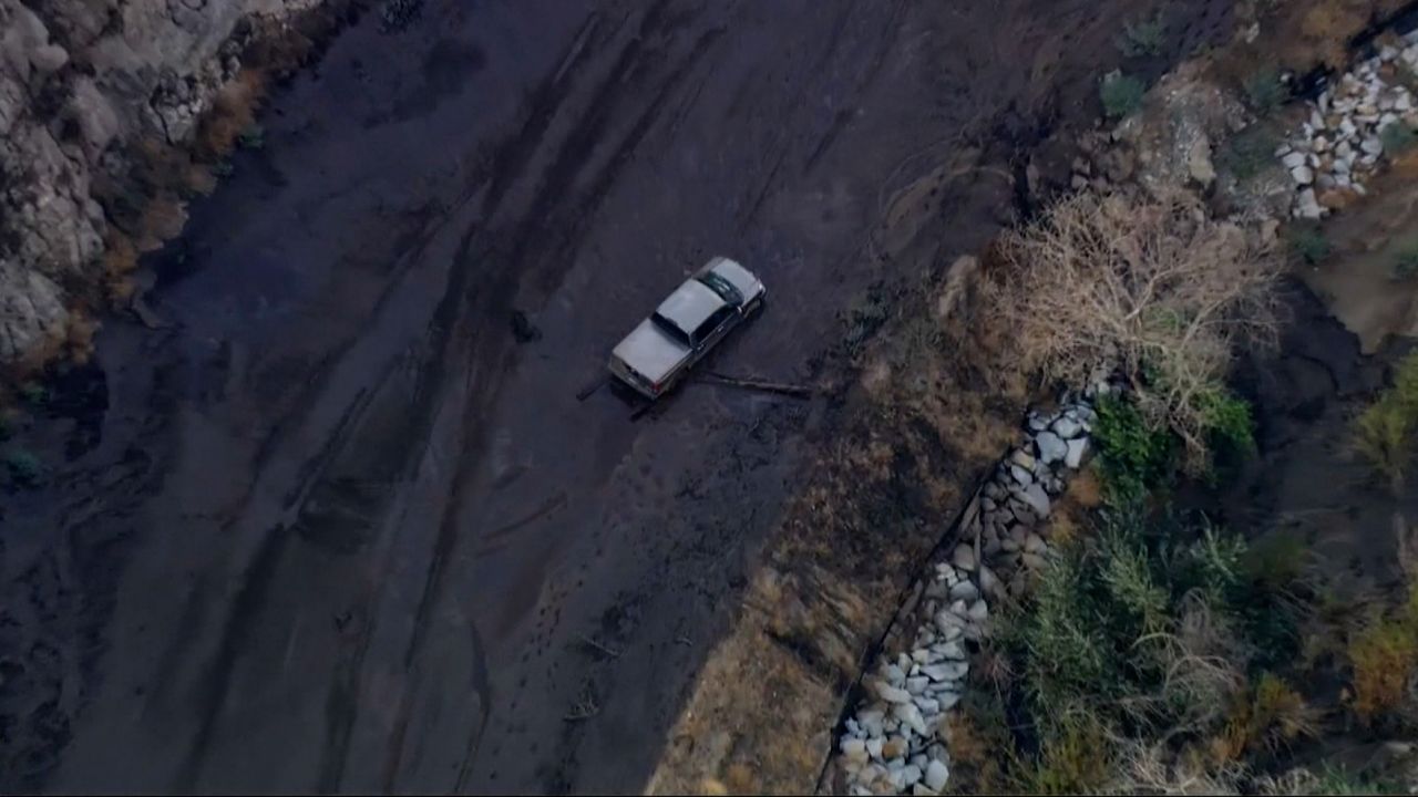 A mudslide trapped drivers in Lake Hughes amid heavy scattered rains.