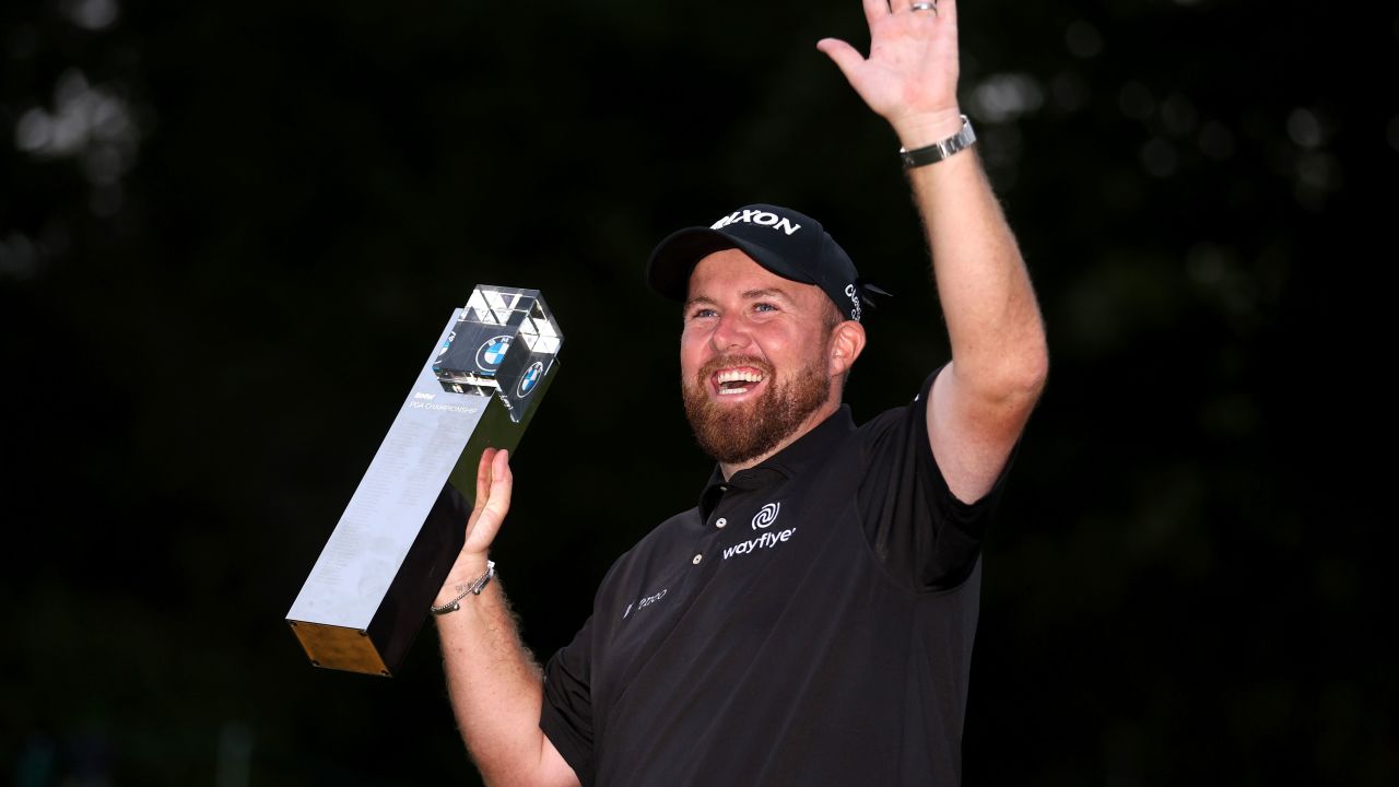 Shane Lowry celebrates with the BMW PGA Championship trophy after winning at Wentworth Golf Club in Virginia Water, England.