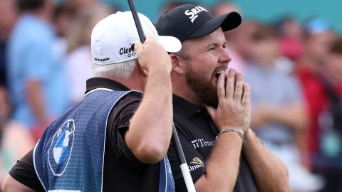 Lowry reacts after finishing at the 18th hole.