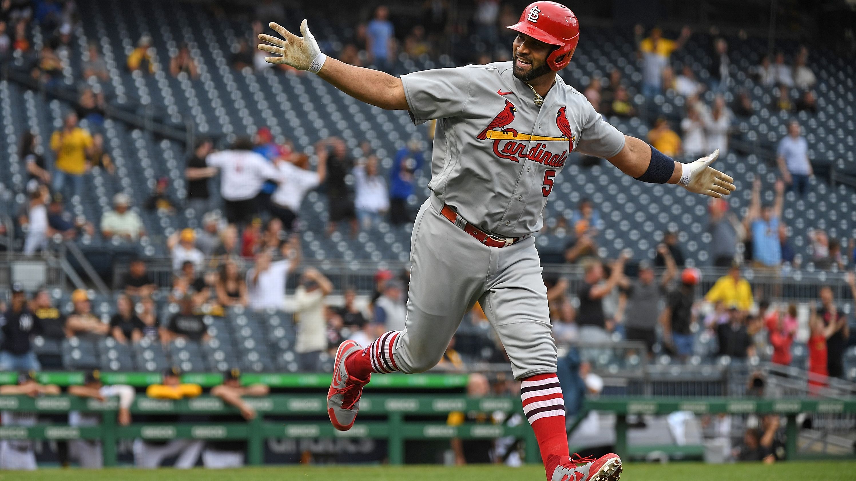 Pujols hit a clutch two-run HR at the top of the ninth to turn the game around for the Cardinals.
