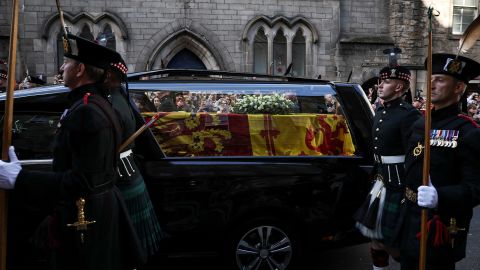 The hearse carrying the Queen's coffin travels through Edinburgh on September 12.