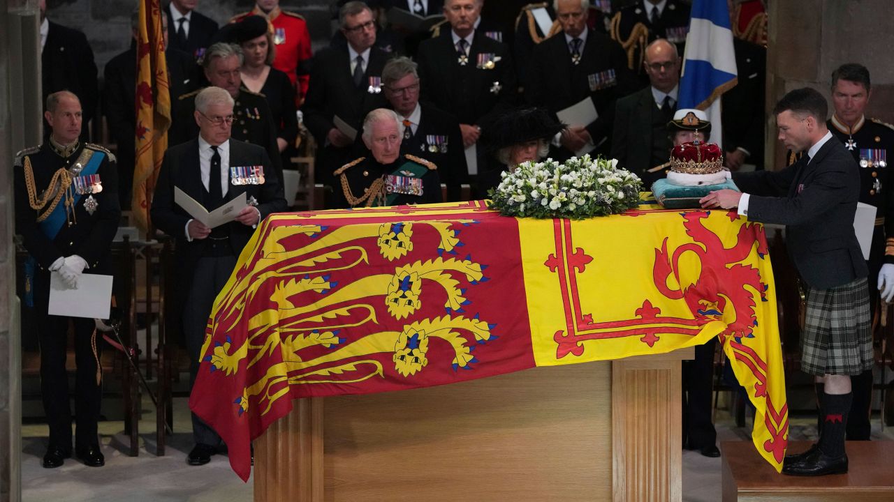 From left, Prince Edward, Prince Andrew, King Charles III, Camilla, the Queen Consort, Princess Anne and Vice Admiral Sir Tim Laurence, look on as the Duke of Hamilton places the Crown of Scotland on the coffin during the prayer service at St Giles' Cathedral, Edinburgh.