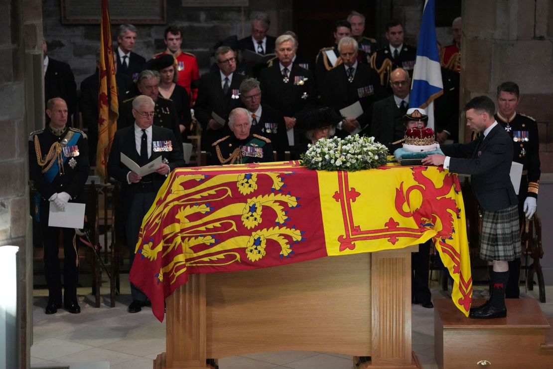 From left, Prince Edward, Prince Andrew, King Charles III, Camilla, the Queen Consort, Princess Anne and Vice Admiral Sir Tim Laurence, look on as the Duke of Hamilton places the Crown of Scotland on the coffin during the prayer service at St Giles' Cathedral, Edinburgh.