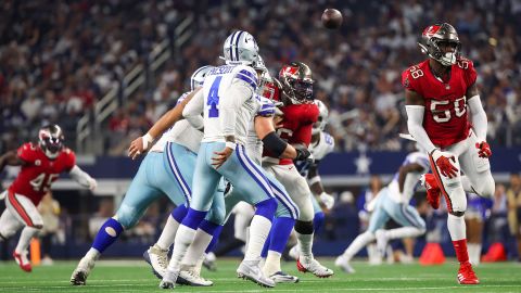 Dallas Cowboys quarterback Dak Prescott reacts after injuring his thumb when he hit his hand against Tampa Bay Buccaneers linebacker Shaq Barrett during the fourth quarter at AT&T Stadium. 