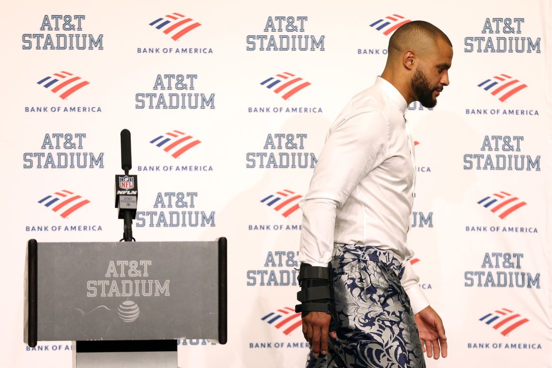 Prescott walks away from the podium during the post-game press conference after losing against the Bucs.