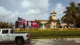 A truck displaying pro-Trump flags is dirven past Mar-a-Lago in Palm Beach, the home of former President Donald Trump, on Tuesday, Aug. 9, 2022, one day after FBI agents searched the residence. When some GOP members of Congress attacked the nation's top law enforcement agencies immediately after the FBI's search of Mar-a-Lago, it opened deep fissures within the party. (Saul Martinez/The New York Times)