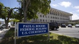 Vehicles sit parked outside of federal court in West Palm Beach, Florida, U.S., on Monday, April 8, 2019. Yujing Zhang appeared in West Palm Beach court Monday for a bail hearing, after being arrested March 30 for having illegally entered President Donald Trump's Mar-a-Lago resort in Palm Beach, Florida, and lying to a Secret Service agent. Photographer: Saul Martinez/Bloomberg