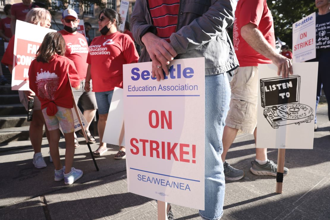 Teachers from Seattle Public Schools picket outside Roosevelt High School on what was supposed to be the first day of classes Wednesday.