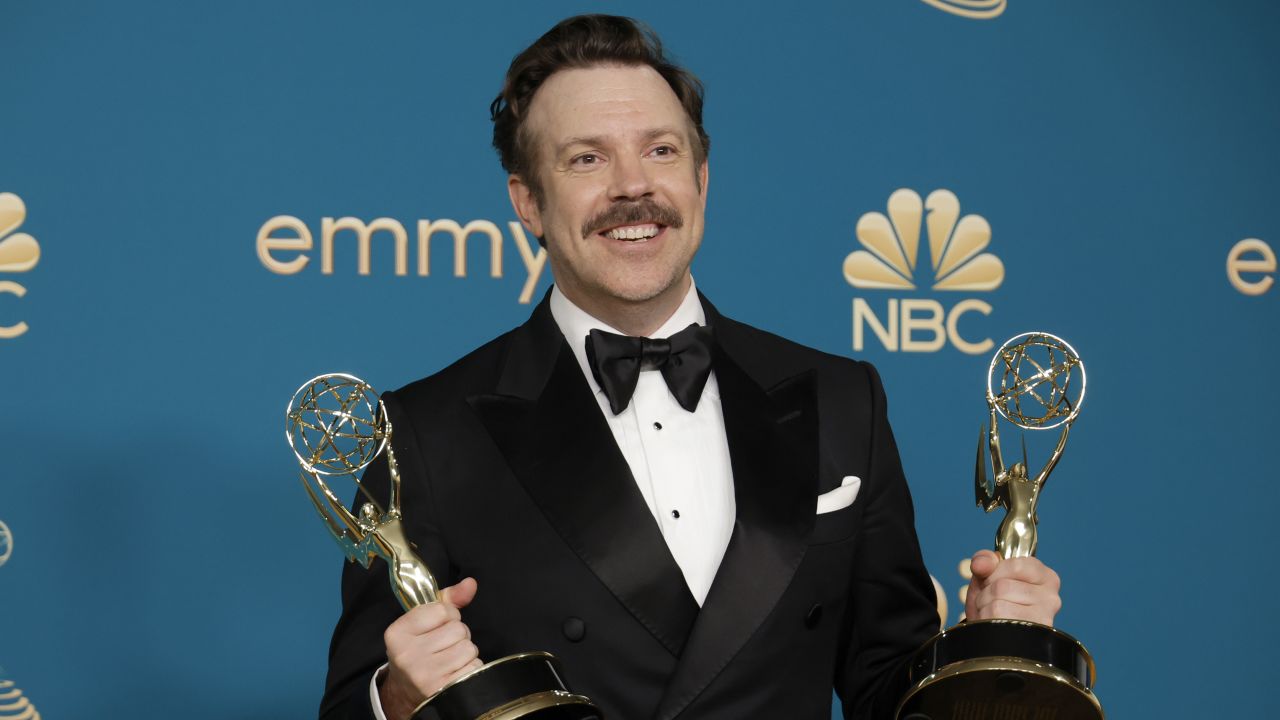 Jason Sudeikis holds his Emmys for "Ted Lasso" at the 2022 Emmy ceremony.