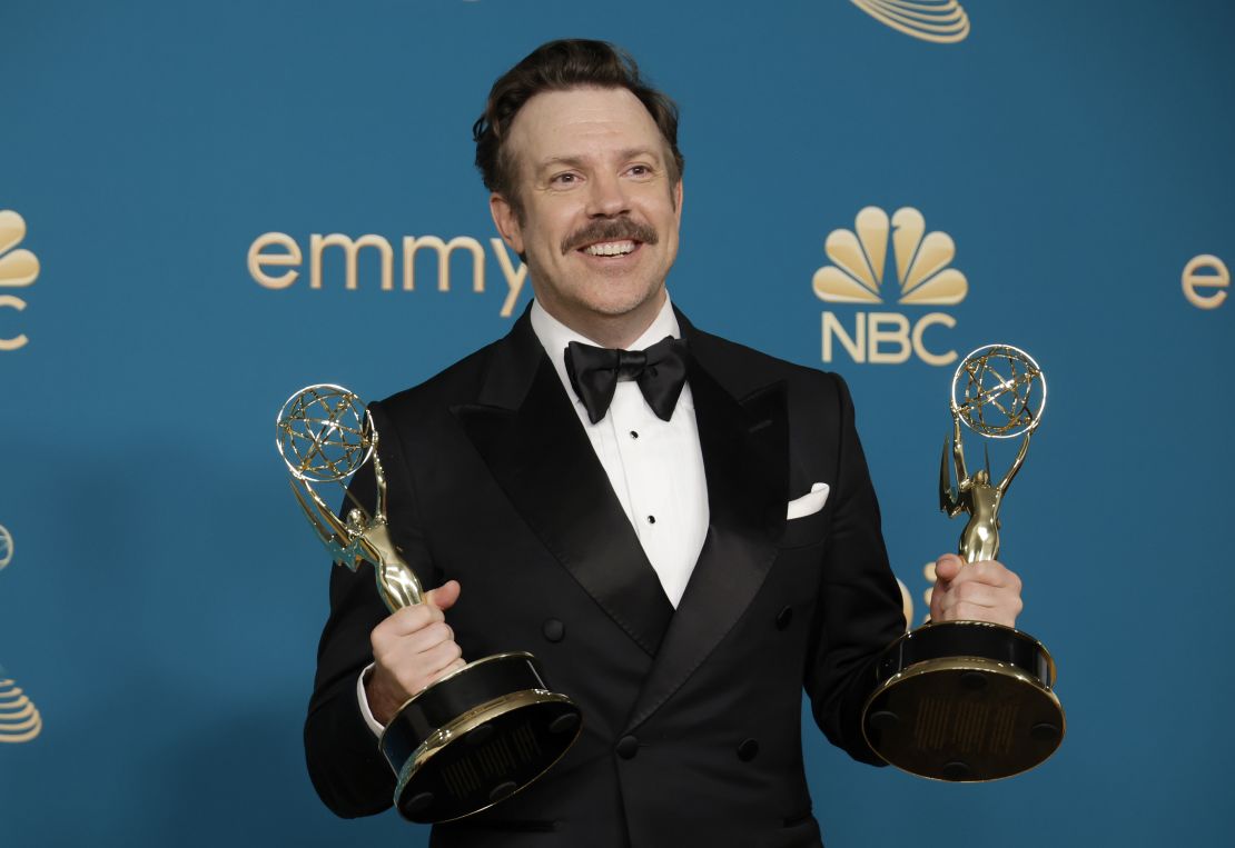 Jason Sudeikis holds his Emmys for "Ted Lasso" at the 2022 Emmy ceremony.