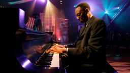 FILE - Recording artist and show host Ramsey Lewis warms up before a taping of the "Legends of Jazz with Ramsey Lewis," Nov. 16, 2005, in WTTW's studio in Chicago. Renowned jazz pianist Lewis, whose music entertained fans over a more than 60-year career that began with the Ramsey Lewis Trio and made him one of the country's most successful jazz musicians, died Monday, Sept. 12, 2022. He was 87. (AP Photo/Charles Rex Arbogast, File)