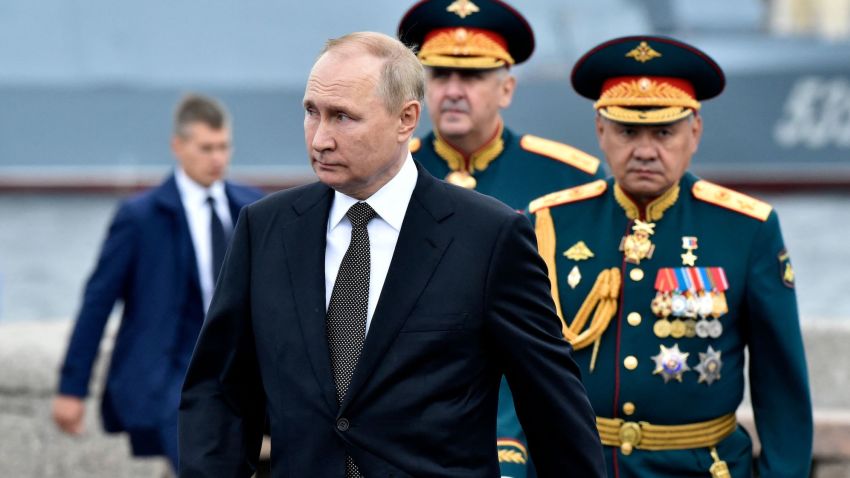 Russia's President Vladimir Putin (L), flanked by Russia's Defence Minister Sergei Shoigu (R), walks as he takes part in the main naval parade marking the Russian Navy Day, in St. Petersburg on July 31, 2022. (Photo by Olga MALTSEVA / AFP) (Photo by OLGA MALTSEVA/AFP via Getty Images)