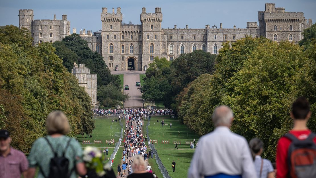 People view flowers and tributes outside Windsor Castle on September 12, 2022.