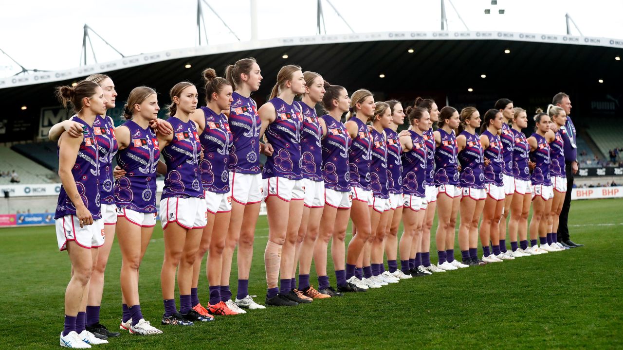 Fremantle Dockers players line up before an AFLW match with the Western Bulldogs in Melbourne, September 9, 2022.