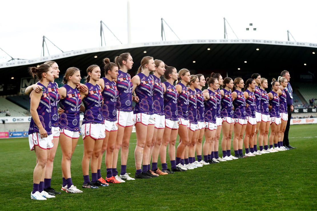 Fremantle Dockers players line up before an AFLW match with the Western Bulldogs in Melbourne, September 9, 2022.