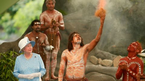 Queen Elizabeth II watches an Aboriginal cultural performance near Cairns, March 2002.