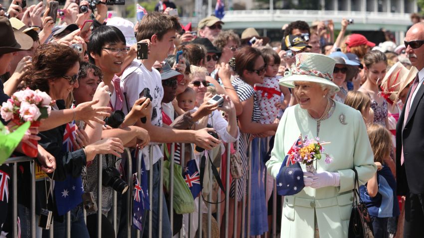 BRISBANE, AUSTRALIA - OCTOBER 24:  Queen Elizabeth II greets the crowd along the Brisbane River on October 24, 2011 in Brisbane, Australia. The Queen and Duke of Edinburgh are on a 10-day visit to Australia and will travel to Canberra, Brisbane, and Melbourne before heading to Perth for the Commonwealth Heads of Government meeting. This is the Queen's 16th official visit to Australia.