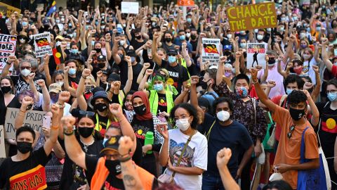 Protesters take part in an