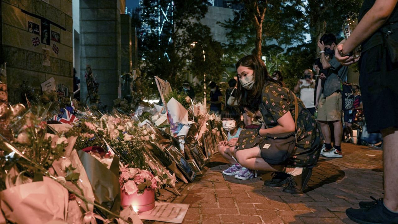 Over 2,500 people lined up to offer condolences to Queen Elizabeth II outside the British consulate in Hong Kong on September 12, 2022.