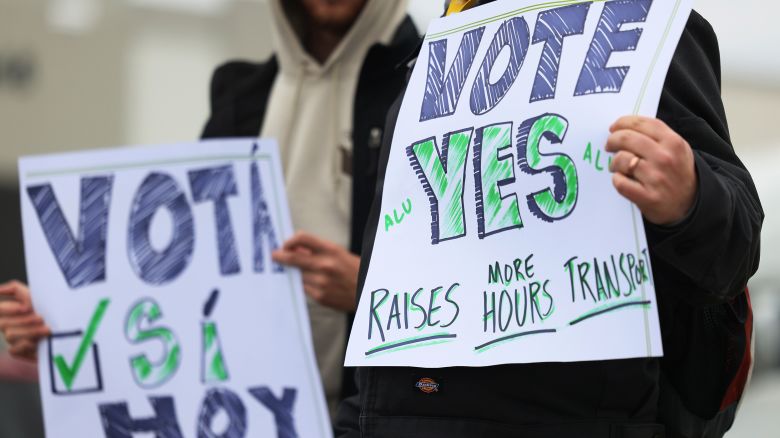 Amazon Labor Union organizers hold signs outside of the LDJ5 Amazon Sort Center on April 25, 2022 in New York City. 