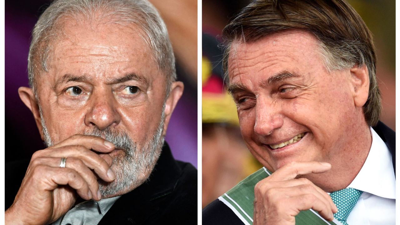 (COMBO) This combination of pictures created on May 4, 2022, ex-Brazilian president Luiz Inacio Lula da Silva (L) gestures during a meeting with members of the Rede Party in Brasilia, on April 28, 2022, to discuss the party's support for Lula's candidacy for president in the upcoming October elections, and another of Brazilian President Jair Bolsonaro smiling during the Brazilian Army Day celebration at the Army headquarters in Brasilia on April 19, 2022. - According to a mid-December poll, President Jair Bolsonaro, was getting crushed in the race for Brazil's October elections, trailing his nemesis, ex-president Luiz Inacio Lula da Silva, so badly it seemed he might lose in the first round. But since then, the far-right incumbent has staged a turnaround, so much so that political analysts now say he could yet come from behind to win a new four-year term. Bolsonaro is seeking reelection while Lula de Silva is scheduled to officially launch his candidacy on May 7 at a rally in Sao Paulo. (Photo by EVARISTO SA / AFP) (Photo by EVARISTO SA/AFP via Getty Images)