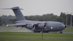 UXBRIDGE, ENGLAND  - SEPTEMBER 13: The RAF aircraft, a C-17 globemaster from 99 squadron carrying the coffin of Queen Elizabeth II lands at RAF Northolt, west London, from where it will be taken to Buckingham Palace, London, to lie at rest overnight in the Bow Room on September 13, 2022 in London, England. The coffin carrying Her Majesty Queen Elizabeth II leaves St Giles Church travelling to Edinburgh Airport where it will be flown to London and transferred to Buckingham Palace by road. Queen Elizabeth II died at Balmoral Castle in Scotland on September 8, 2022, and is succeeded by her eldest son, King Charles III. (Photo by Andrew Matthews - WPA Pool/Getty Images)