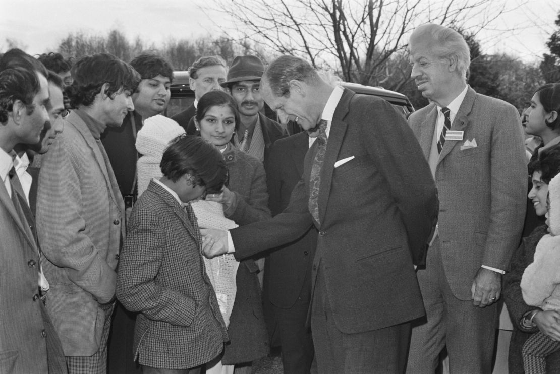 Prince Philip meets Ugandan Asians at a British reception center in Kent, November 1972. 