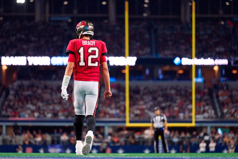 ARLINGTON, TX - SEPTEMBER 11: Tom Brady #12 of the Tampa Bay Buccaneers walks down field against the Dallas Cowboys at ATT Stadium on September 11, 2022 in Arlington, TX. (Photo by Cooper Neill/Getty Images)