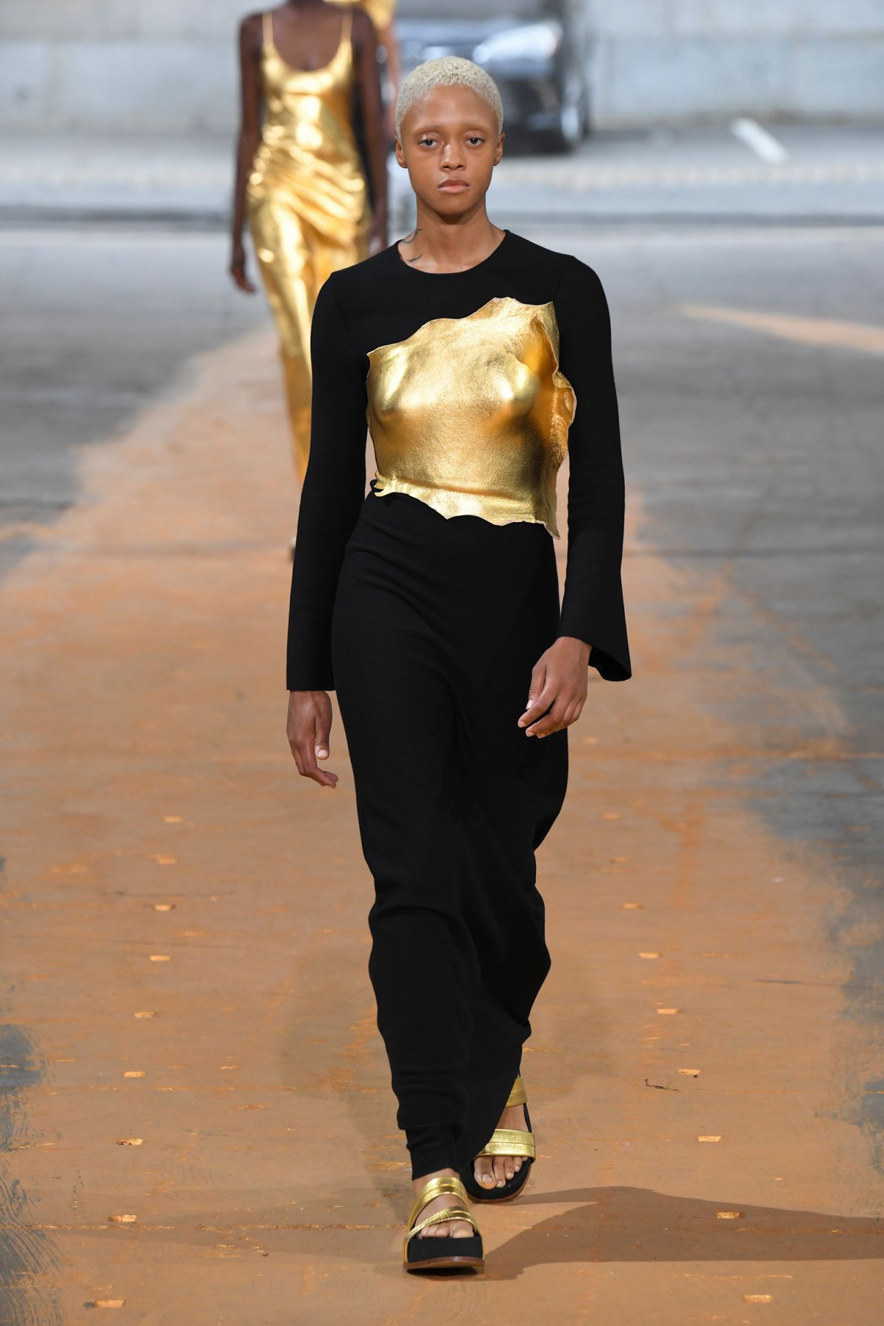 Gold was a focus of Gabriela Hearst's Sappho-inspired collection, in fabrics, accents and detailing. True to her sustainability efforts, Hearst said: "All of our materials are soundly investigated... there's not one material in this collection that I didn't approve or know the composition of."