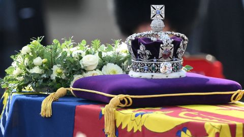 The coffin, topped with the royal standard and adorned with the imperial state crown.