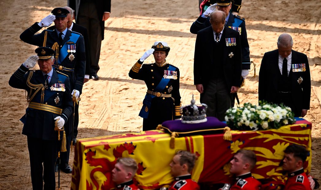 The King, Prince William and Princess Anne salute the Queen's coffin beside Prince Harry and Prince Andrew on Wednesday.