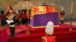 LONDON, ENGLAND - SEPTEMBER 14: A general view as the coffin carrying Queen Elizabeth II rests in Westminster Hall for the Lying-in State on September 14, 2022 in London, England. Queen Elizabeth II's coffin is taken in procession on a Gun Carriage of The King's Troop Royal Horse Artillery from Buckingham Palace to Westminster Hall where she will lay in state until the early morning of her funeral. Queen Elizabeth II died at Balmoral Castle in Scotland on September 8, 2022, and is succeeded by her eldest son, King Charles III.  (Photo by David Ramos/Getty Images)