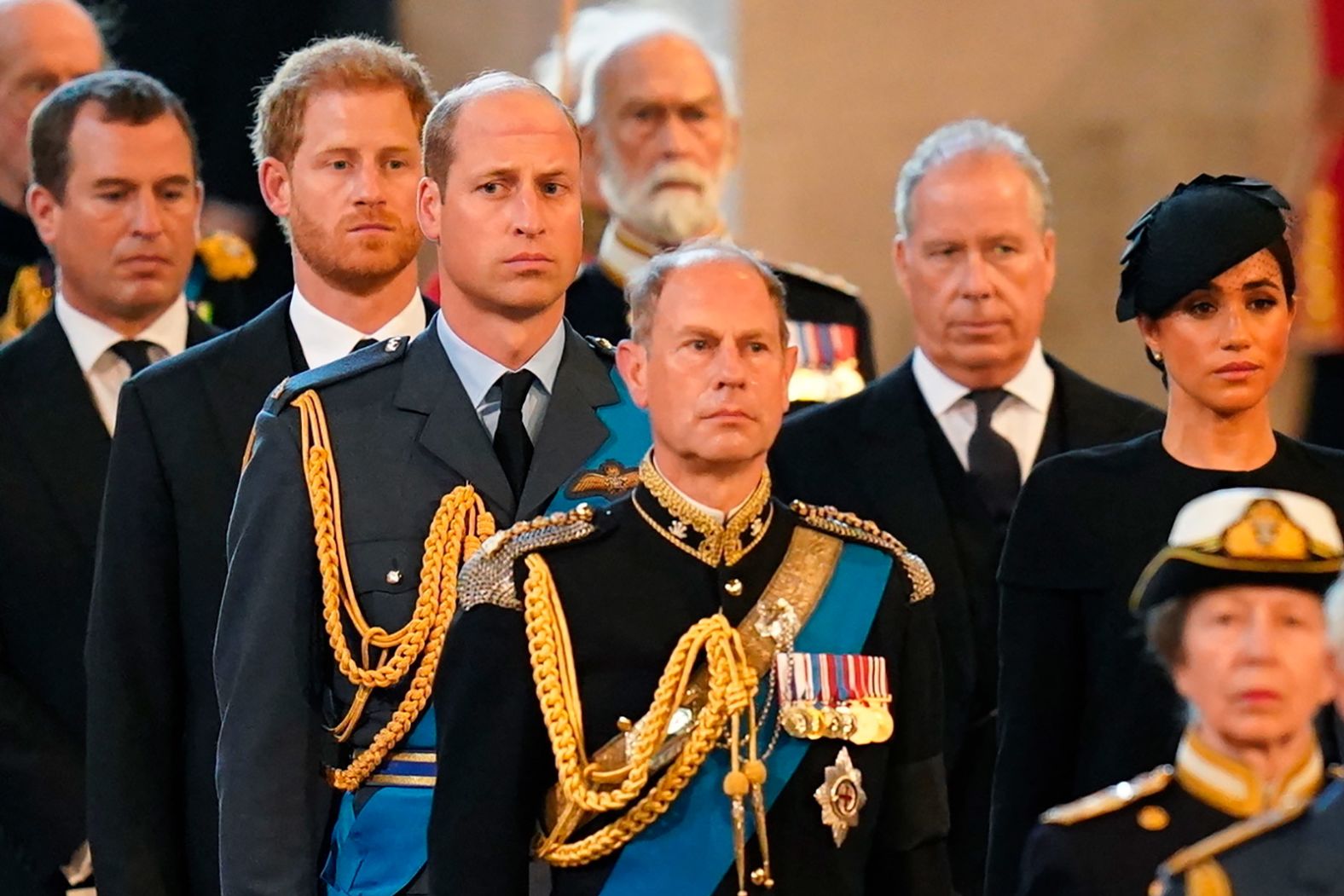 Members of the royal family follow the bearer party carrying the Queen's coffin into Westminster Hall.