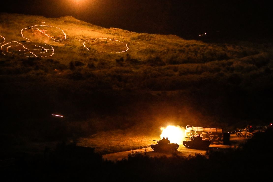 Tanks fire projectiles during a Taiwanese military live-fire drill, after Beijing increased its military exercises near Taiwan in September.