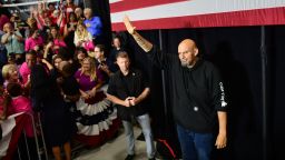 BLUE BELL, PA - SEPTEMBER 11: Democratic Pennsylvania Senate nominee John Fetterman acknowledges supporters during a rally with U.S. Congresswomen Madeleine Dean and Mary Gay Scanlon on September 11, 2022 at Montgomery County Community College in Blue Bell, Pennsylvania. In the November general election, Fetterman faces U.S. Senate candidate Dr. Mehmet Oz. (Photo by Mark Makela/Getty Images)