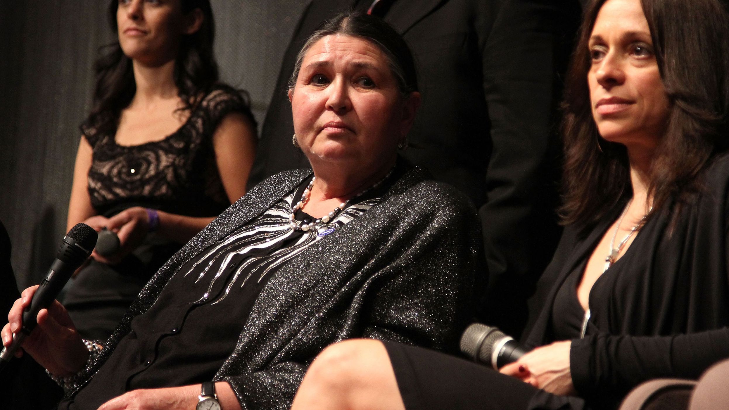 Littlefeather (left), pictured in 2010, said she faced personal and professional blowback as a result of taking a stand.