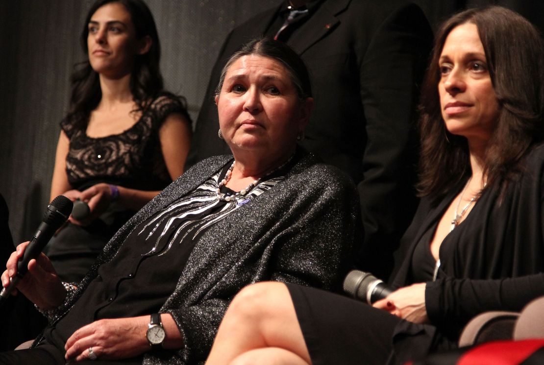 Littlefeather (left), pictured in 2010, said she faced personal and professional blowback as a result of taking a stand.