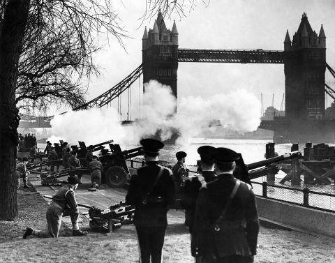 Members of the Honourable Artillery Company fire a gun salute in London.