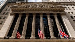 Statues adorn the facade of the New York Stock Exchange, Tuesday, Sept. 13, 2022, in New York. (AP Photo/Julia Nikhinson)