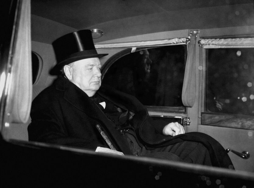Prime Minister Winston Churchill leaves St. James's Palace after attending a meeting of the Accession Council, which is automatically summoned on the death of the sovereign.