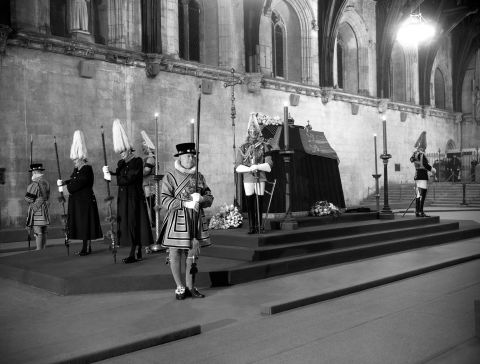 The King's coffin lies in state at Westminster Hall.