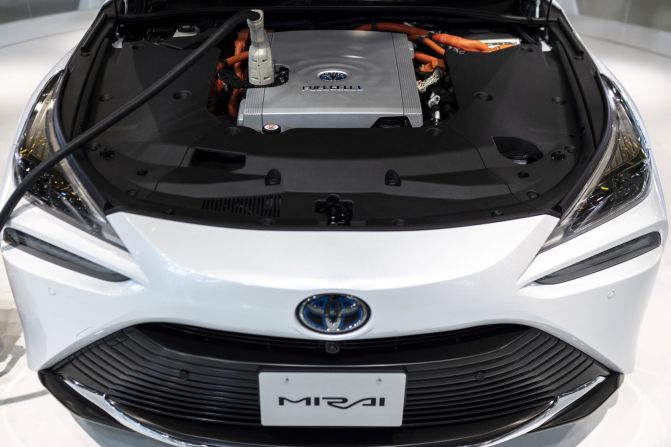 The Toyota Mirai (which translates to "future" in Japanese), pictured here in a Tokyo showroom in 2021, also runs on a hydrogen fuel cell. On a full tank of hydrogen, it can travel as far as a similar-sized petrol car, <a href="index.php?page=&url=https%3A%2F%2Fwww.toyota-europe.com%2Fworld-of-toyota%2Ffeel%2Fenvironment%2Fbetter-air%2Ffuel-cell-vehicle" target="_blank" target="_blank">Toyota says</a>, and refueling takes up to five minutes.