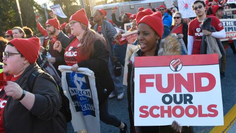 Teachers and supporters rally in 2019 in Annapolis, Maryland. Baltimore union members asked for fans to be donated to cool sweltering classrooms without air-conditioning.