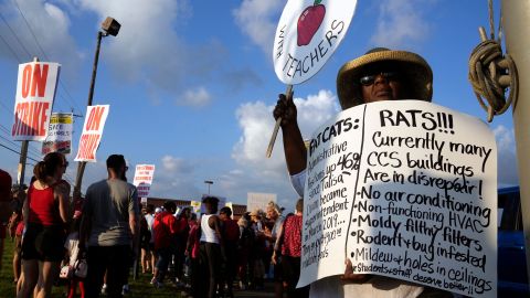  A demonstrator in Columbus, Ohio, rallies in support of teachers at a Columbus Education Association protest in August.